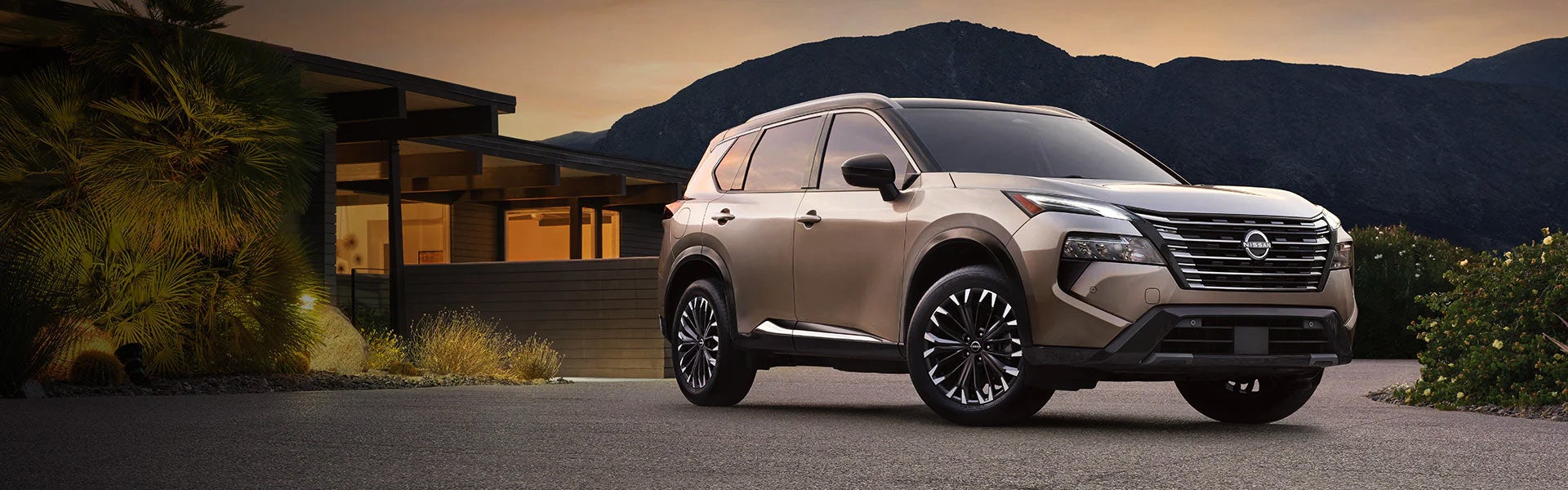 The front grille of the 2024 Nissan Rogue in Pompano Beach, FL