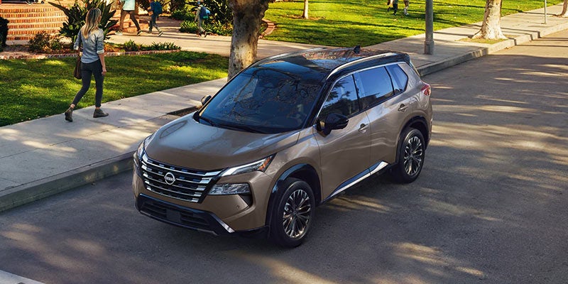 A 2024 Nissan Rogue parked on a curb after its owner runs an errand in Pompano Beach, FL